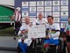 Nella foto, tratta dal profilo facebook di Vittorio Podestà, il chiavarese e gli altri azzurri, sul podio, con la maglia iridata e la dedica al compianto ct dell'ItalCiclismo Alfredo Martini