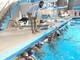 Il presidente della Pro Recco, Maurizio Felugo, con i bimbi dell'Academy alle piscine di Albaro di Genova
