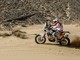 Andrea Gaggiani in azione sulla sua moto, tra le dune del deserto